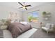 Cozy bedroom featuring a comfortable bed, soft lighting, and serene decor to create a relaxing atmosphere at 2354 E Lieber Pl, Phoenix, AZ 85024