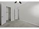 Bedroom featuring neutral paint, carpet, natural light, and a walk-in closet at 2354 E Lieber Pl, Phoenix, AZ 85024