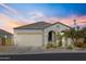 Charming single-story home with a well-maintained front yard, two-car garage, and inviting curb appeal at 2354 E Lieber Pl, Phoenix, AZ 85024