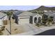 Charming single-Gathering home with neutral color palette, covered porch, paver driveway and attached two-car garage at 2354 E Lieber Pl, Phoenix, AZ 85024