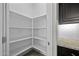 View of the spacious walk-in pantry with abundant shelving space for organized storage at 2354 E Lieber Pl, Phoenix, AZ 85024