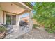 Covered patio featuring a grill and dining set, perfect for enjoying meals outdoors at 266 N Piedra Way, Mesa, AZ 85207