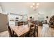 Open floor plan featuring a dining area connected to the kitchen and living space at 266 N Piedra Way, Mesa, AZ 85207