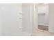 Bright bathroom featuring a walk-in shower and tile flooring at 29109 N Fire Agate Rd, San Tan Valley, AZ 85143