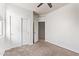 Bedroom featuring sliding closet doors and tile flooring nearby at 29109 N Fire Agate Rd, San Tan Valley, AZ 85143