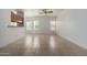 Open dining area with tile flooring, windows, and access to the kitchen, creating a bright and inviting space at 3165 W Golden Ln, Chandler, AZ 85226