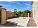The home's backyard has a shed, a basketball hoop and a concrete slab for playing ball at 3169 E Eleana Ln, Gilbert, AZ 85298