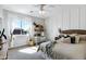 Bright bedroom featuring a light color palette, decorative shelves, and natural light at 3169 E Eleana Ln, Gilbert, AZ 85298