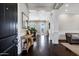 Elegant entry foyer with dark hardwood floors and a view to the backyard at 3169 E Eleana Ln, Gilbert, AZ 85298