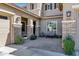 Charming front porch with stone accents and cozy seating area, perfect for relaxing outdoors at 3169 E Eleana Ln, Gilbert, AZ 85298