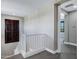 Bright hallway with a staircase and shuttered window, leading to other rooms at 3169 E Eleana Ln, Gilbert, AZ 85298