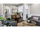 Spacious living room with hardwood floors, staircase, and elegant furnishings perfect for entertaining at 3169 E Eleana Ln, Gilbert, AZ 85298