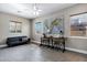 Bright living room provides ample light through windows and a ceiling fan at 3169 E Eleana Ln, Gilbert, AZ 85298