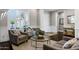 Elegant living room with neutral colors, plantation shutters, and comfortable seating at 3169 E Eleana Ln, Gilbert, AZ 85298