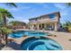 Gorgeous backyard oasis with a large pool, relaxing spa, and covered patio for outdoor living at 3169 E Eleana Ln, Gilbert, AZ 85298