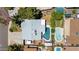 Aerial view of property showcasing the backyard pool, mature trees and overall layout at 3736 W Angela Dr, Glendale, AZ 85308