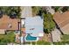 Aerial view of the property showing the backyard pool, patio, and mature landscaping at 3736 W Angela Dr, Glendale, AZ 85308