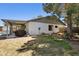 Spacious backyard view highlighting the home's exterior and a well-maintained lawn at 3736 W Angela Dr, Glendale, AZ 85308