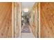 Inviting entryway featuring double wooden doors, tile flooring, and a view of the living room at 3736 W Angela Dr, Glendale, AZ 85308