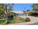 Attractive single-Gathering home with a two-car garage, green lawn, and mature trees at 3736 W Angela Dr, Glendale, AZ 85308