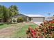 Charming single-story home with a well-maintained lawn and a brick exterior at 3736 W Angela Dr, Glendale, AZ 85308