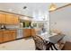 Open concept kitchen with stainless steel appliances and access to dining area at 3736 W Angela Dr, Glendale, AZ 85308