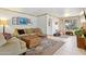 Comfortable living room with a cozy seating area, tile floors, and natural light at 3736 W Angela Dr, Glendale, AZ 85308