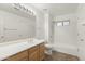 This bathroom features a standard vanity with toilet, shower, and tub combo at 39016 N Habitat Cir, Cave Creek, AZ 85331