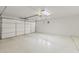 Spacious and clean garage with an automatic door, offering plenty of room for parking and storage at 39016 N Habitat Cir, Cave Creek, AZ 85331