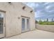 Outdoor patio showcases stucco walls and views of the desert landscape at 39016 N Habitat Cir, Cave Creek, AZ 85331