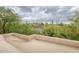 Rooftop view shows desert landscaping with saguaro cactus and other native greenery at 39016 N Habitat Cir, Cave Creek, AZ 85331