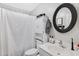 This bathroom has a toilet, sink, shower and cabinet with an elegant mirror at 4030 E Meadow Creek Way, San Tan Valley, AZ 85140