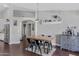 Charming dining area with wood table and stylish decor, perfect for Gathering meals at 4030 E Meadow Creek Way, San Tan Valley, AZ 85140