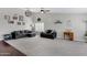 Bright living room with high ceilings, plush carpeting, and stylish neutral decor at 4030 E Meadow Creek Way, San Tan Valley, AZ 85140