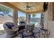 Outdoor patio featuring a ceiling fan, comfortable seating, and stylish decor near the pool at 4030 E Meadow Creek Way, San Tan Valley, AZ 85140