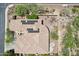 Aerial view of the home's roof with solar panels, landscaping, and outdoor entertaining spaces at 41602 N Congressional Dr, Phoenix, AZ 85086