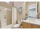 Bathroom with a standard tub and vanity at 41602 N Congressional Dr, Phoenix, AZ 85086