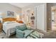 Cozy bedroom featuring a comfortable chair at 41602 N Congressional Dr, Phoenix, AZ 85086