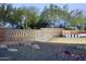 Grand entrance to Anthem Country Club showcasing a water feature and desert-inspired landscaping at 41602 N Congressional Dr, Phoenix, AZ 85086