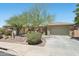 Beautiful single story home with desert landscaping and stone accents at 41602 N Congressional Dr, Phoenix, AZ 85086