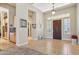 Open concept foyer with high ceilings and tile floors at 41602 N Congressional Dr, Phoenix, AZ 85086