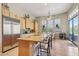Kitchen features granite countertops, stainless steel appliances, and tile flooring at 41602 N Congressional Dr, Phoenix, AZ 85086