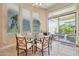 Dining area off kitchen with access to the backyard patio at 41602 N Congressional Dr, Phoenix, AZ 85086