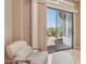 A cozy sitting room featuring comfortable furniture and a view of the backyard at 41602 N Congressional Dr, Phoenix, AZ 85086