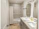 Lovely bathroom with a double vanity, granite countertops, and shower-tub combination at 4202 E Sahuaro Dr, Phoenix, AZ 85028