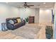 Inviting living room featuring comfortable seating, stylish decor, and hardwood floors at 4202 E Sahuaro Dr, Phoenix, AZ 85028