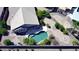 Aerial view of home featuring a pool, covered patio, and desert landscaping at 44468 W Eddie Way, Maricopa, AZ 85138