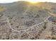 Breathtaking aerial view of hiking trails, parking lot, and mountain scenery at 4636 E Carmen St, Phoenix, AZ 85044