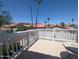 A balcony surrounded by a white fence, and beautiful views of the neighborhood at 4636 E Carmen St, Phoenix, AZ 85044