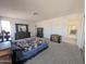 Large main bedroom features carpeted floor and walk-in to the bathroom at 4636 E Carmen St, Phoenix, AZ 85044